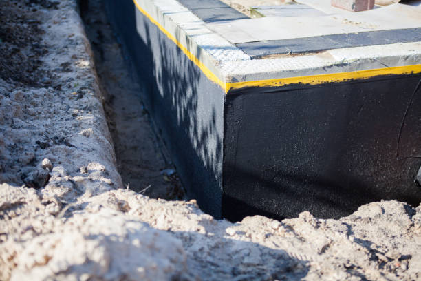 Residential Interior Drainage System installation at a New Goshen, IN home by SJ Waterproofing Pros